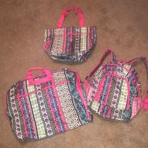 Matching back pack, large tote bag and garmet bag